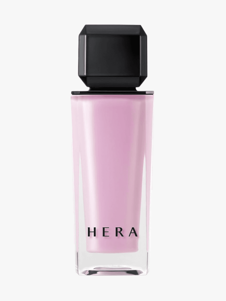 Hera Sensual Nude Lip Gloss in branded component on a light gray background